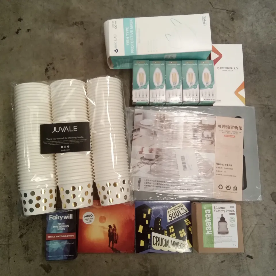 PALLET OF ASSORTED ITEMS INCLUDING JUVALE PAPER CUP, TEETH WHITENING STRIPS, PROTECTIVE MASK, SILICONE YUMMY POUCH, LED FILAMENT BULB, MUSIC ALBUMS