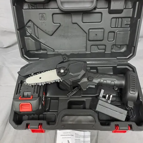 Cordless reciprocating saw with blade in hard case