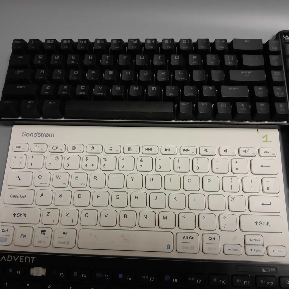LOT OF 4 ASSORTED WIRELESS KEYBOARDS TO INCLUDE SANSDTROM AND ADVENT