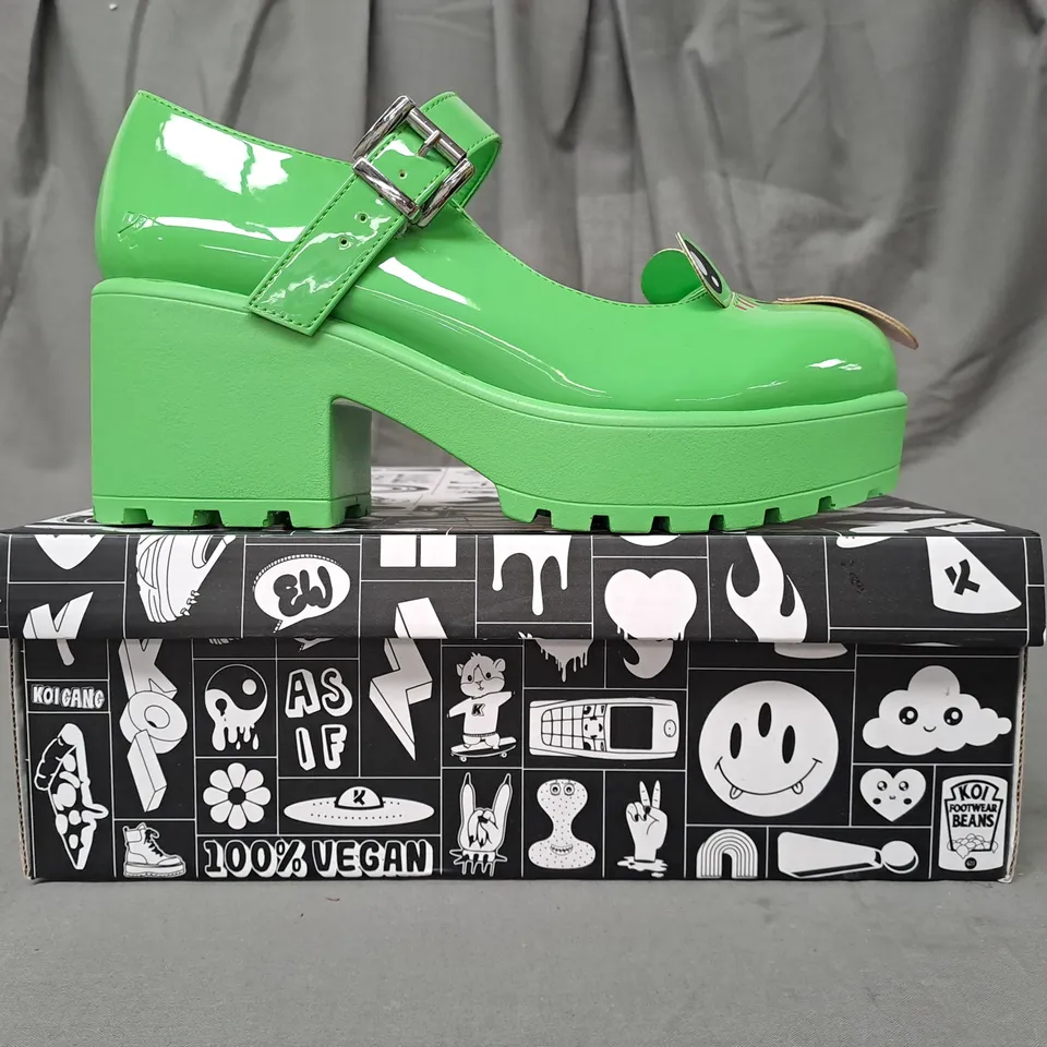 BOXED PAIR OF KOI VEGAN PLATFORM BLOCK HEEL SHOES IN GREEN SIZE 6