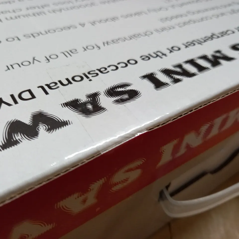 BOXED CORDLESS MINI HANDHELD SAW 