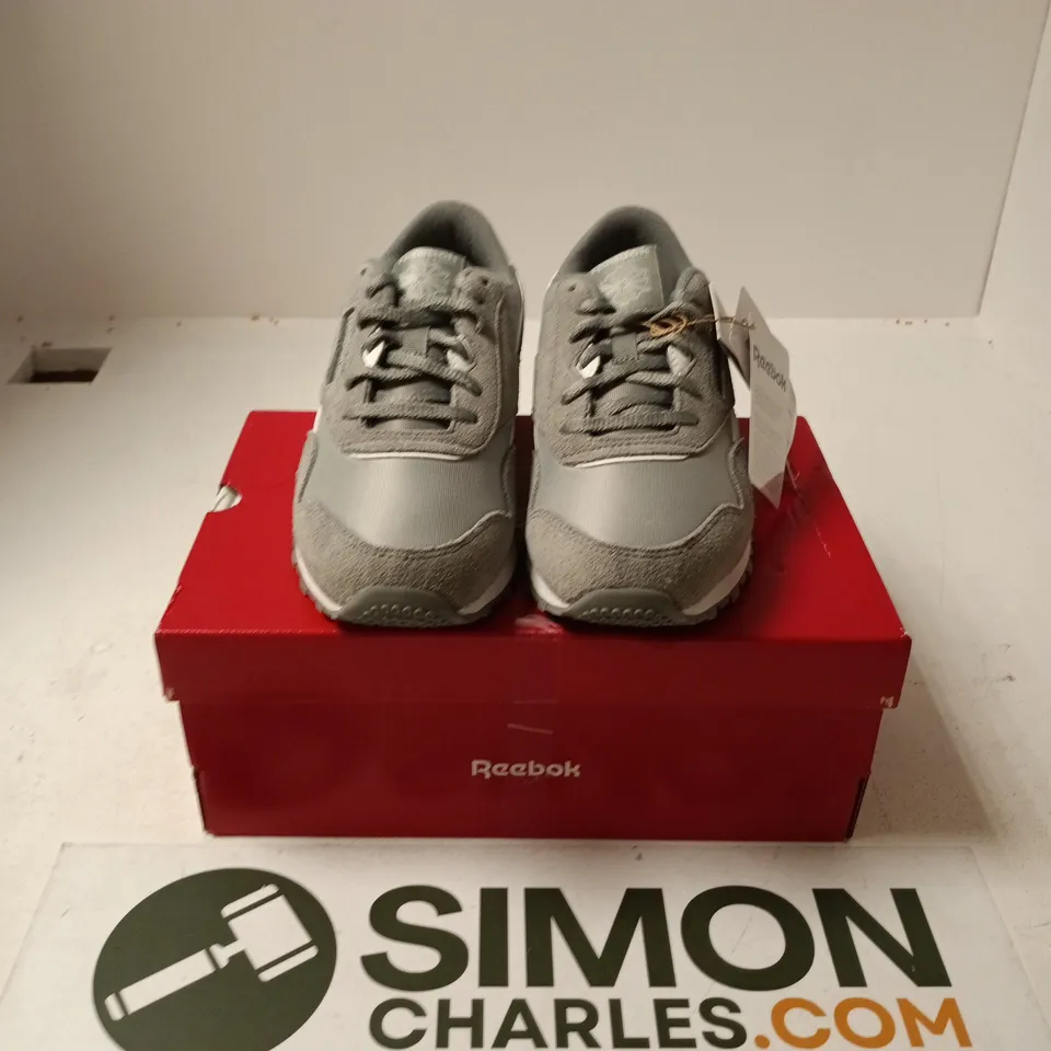 BOXED PAIR OF REEBOK CL NYLON KIDS RUNNING SHOES IN GREY - UK 5