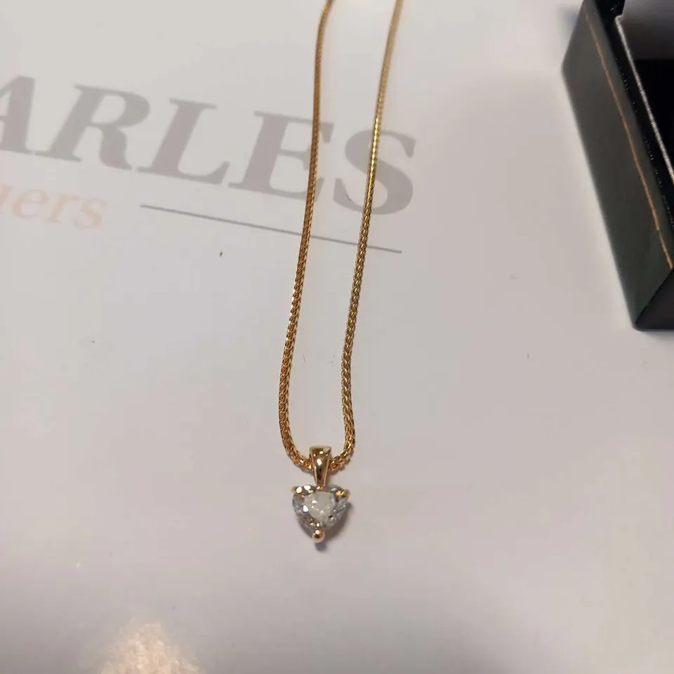 18CT YELLOW GOLD PENDANT ON CHAIN, SET WITH A NATURAL HEART SHAPED DIAMOND