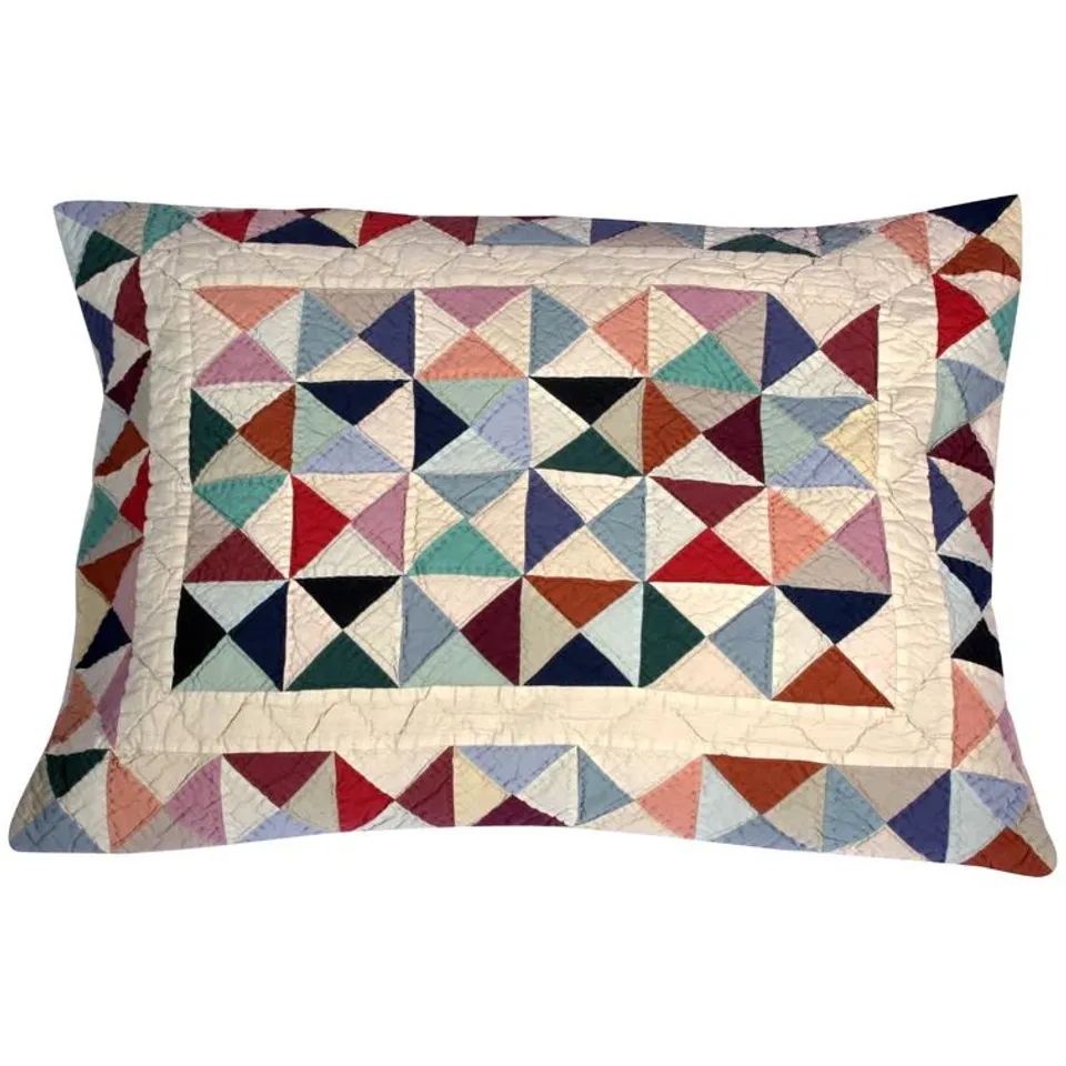 A BOXED OCOTILLO PATCHWORK RECTANGULAR SCATTER CUSHION WITH FILLING