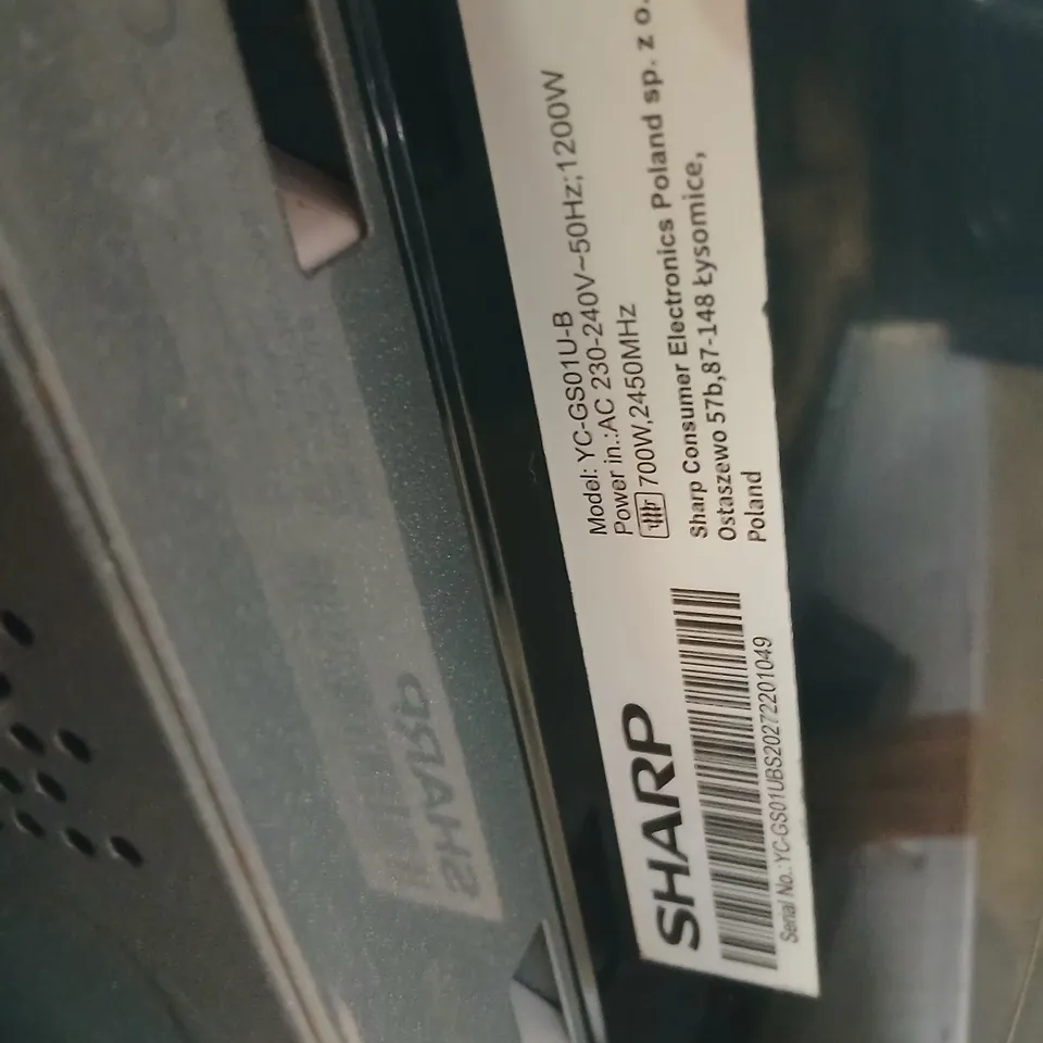 SHARP MICROWAVE OVEN – BLACK, 700W (MODEL: YC-G5011L-B) 