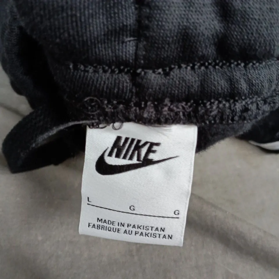 NIKE JOGGERS WITH SIDE STRIPE IN BLACK SIZE L