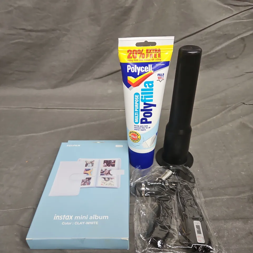 TOTE OF ASSORTED HOUSEHOLD ITEMS TO INCLUDE OUTDOOR LIGHTS, INSTAX MINI ALBUM AND POLYFILLA