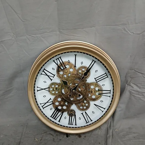 BRASS-TONE SKELETON GEAR WALL CLOCK WITH ROMAN NUMERALS