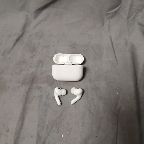 WHITE TRUE WIRELESS EARBUDS WITH CHARGING CASE – RESEMBLES APPLE AIRPODS PRO. MODEL UNSPECIFIED.