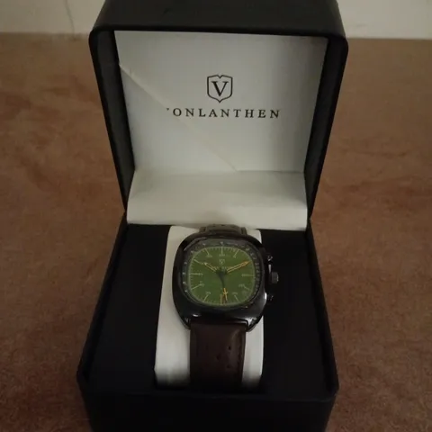 VONLANTHEN AVIATION WATCH FEATURING A GREEN DIAL AND A BROWN PERFORATED LEATHER STRAP 