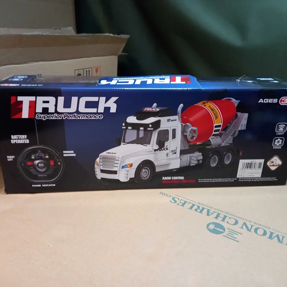 BOXED R/C HEAVY MACHINE TRUCK - AGE 3+ YEARS