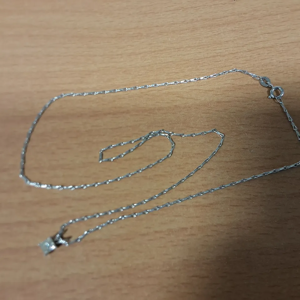 18CT WHITE GOLD PENDANT ON CHAIN SET WITH A NATURAL PRINCESS CUT DIAMOND