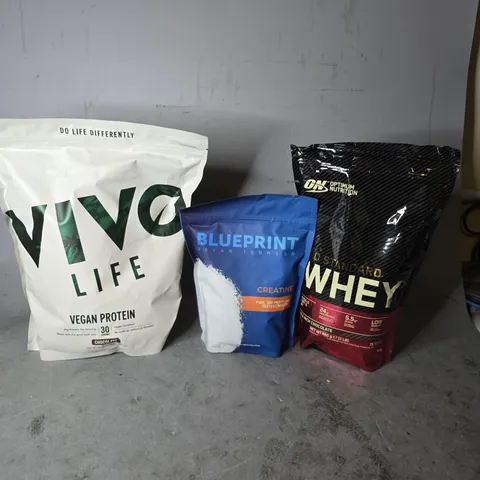 APPROXIMATELY 3 ASSORTED FOOD ITEMS TO INCLUDE - VIVO LIFE VEGAN PROTEIN , BLUEPRINT CREATINE  , WHEY STANDARD DOUBLE RICH CHOCOLATE ETC