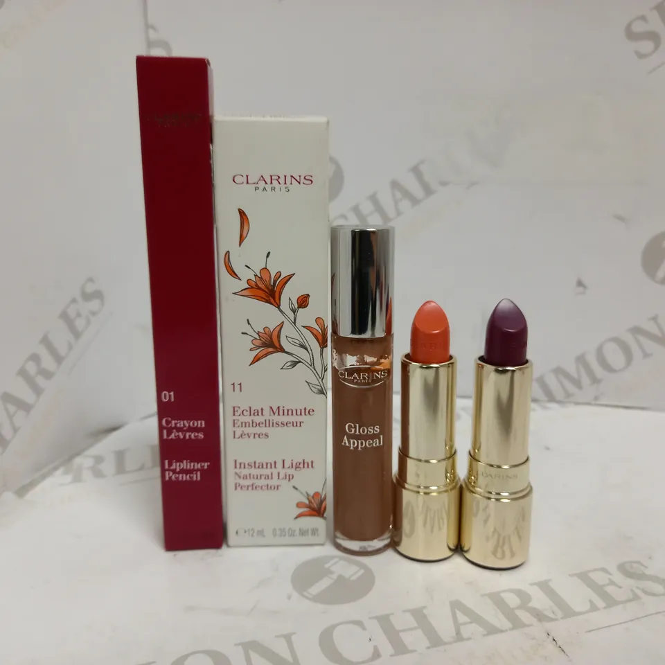 LOT OF APPROXIMATELY 80 CLARINS LIP MAKE-UP ITEMS