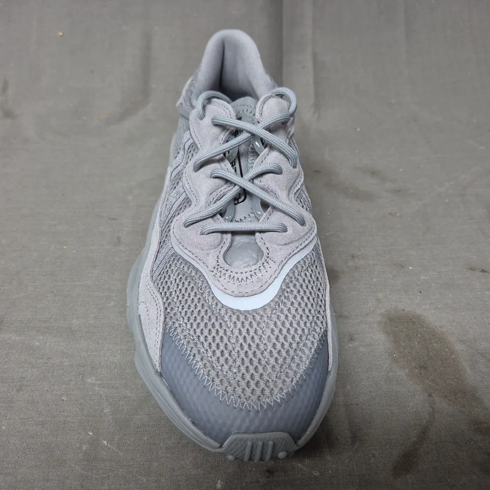 BOXED PAIR OF ADIDAS OZWEEGO SHOES IN GREY UK SIZE 7