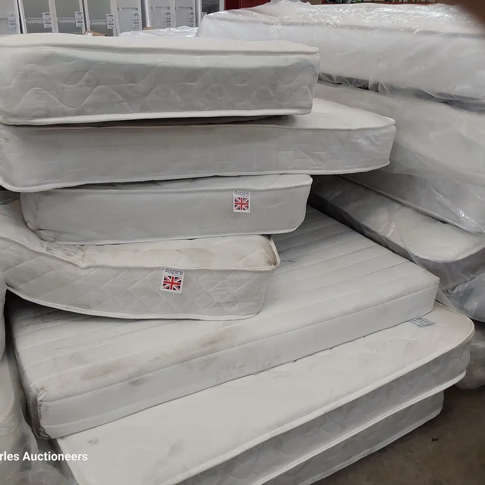 PALLET OF SEVEN ASSORTED UNBAGGED MATTRESSES SINGLES & DOUBLES