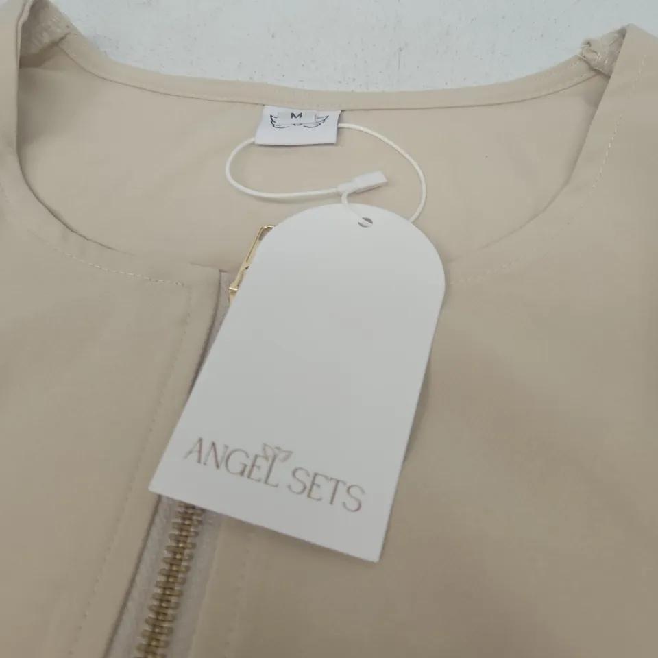 ANGEL SETS BEIGE WOMEN'S ZIP-FRONT TOP WITH POCKETS, SIZE M