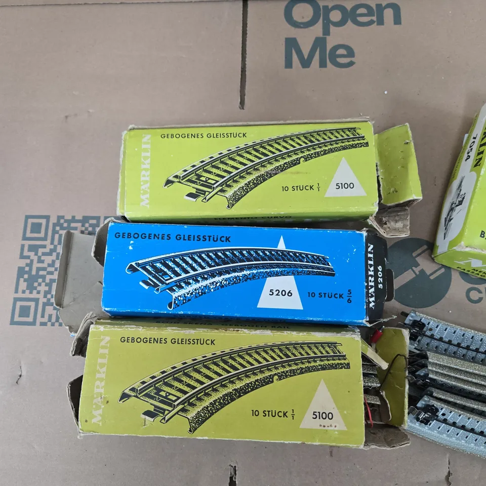 MÄRKLIN TRACK PIECES AND LEVEL CROSSING