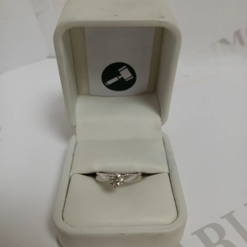 DESIGNER PLATINUM SOLITAIRE RING SET WITH A DIAMOND +-0.50CT