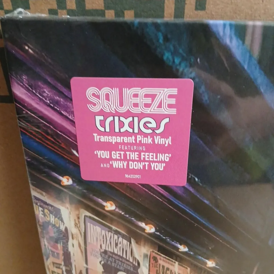 SQUEEZE – TRIXIES ALBUM BUNDLE TO INCLUDE; TRANSPARENT PINK VINYL, 2CD + BLU-RAY, TRIXIES SINGLE ON VINYL, GLEN TILBROOK SIGNED TRIXIES CONCOCTIONS MENU MERCHANDISE