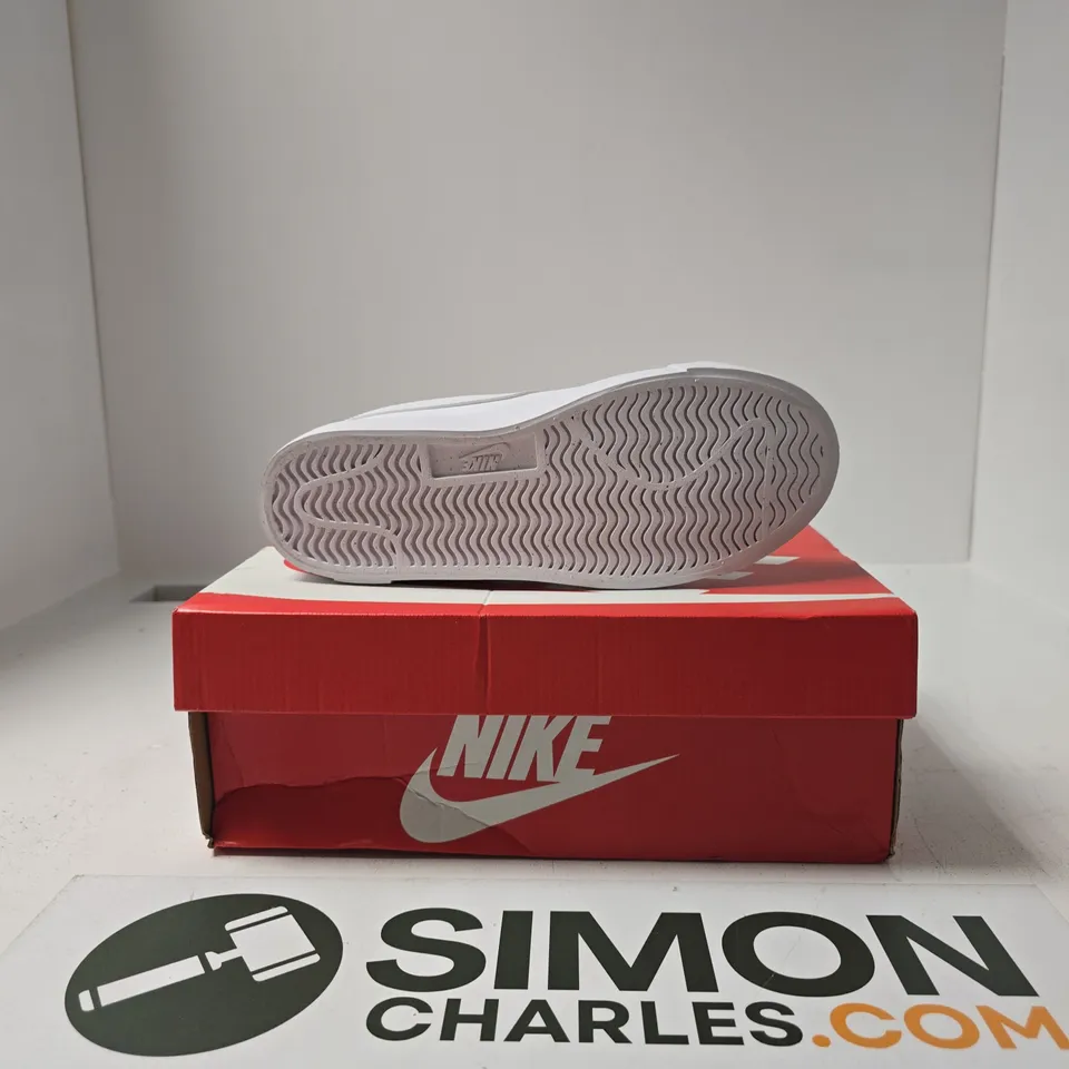 BOXED PAIR OF NIKE TENNIS ESSENTIAL SHOES SIZE 5