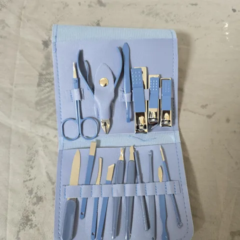 BLUE MANICURE SET IN ROLL-CASE WITH ASSORTED NAIL TOOLS