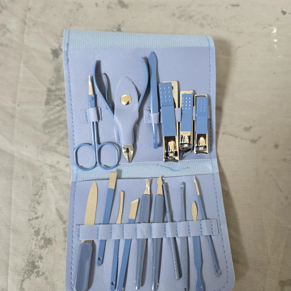 BLUE MANICURE SET IN ROLL-CASE WITH ASSORTED NAIL TOOLS