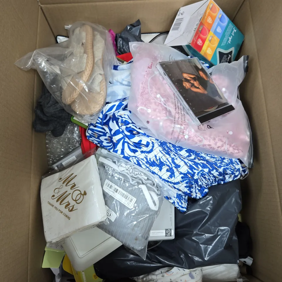 BOX OF APPROXIMATELY 15 ASSORTED ITEMS INCLUDING MR & MRS NAPKINS, A PINK SEQUIN SKIRT AND SOME SANDALS