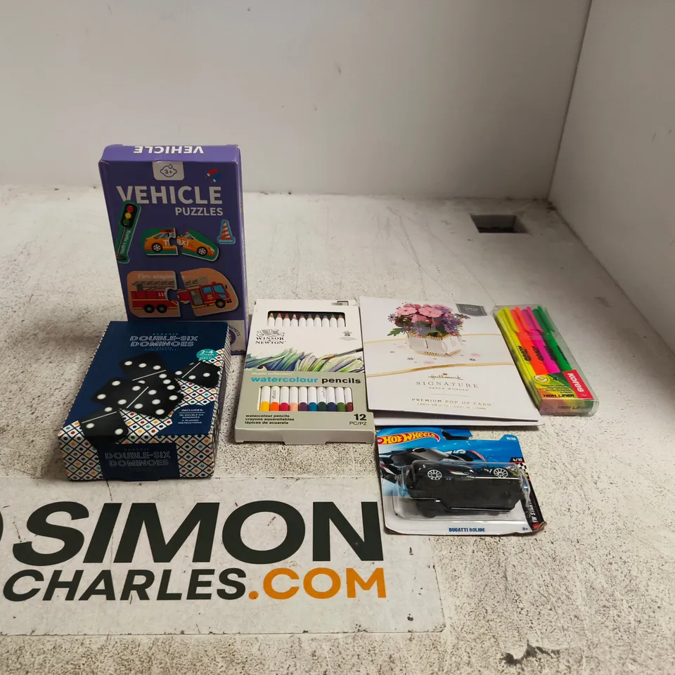 TOTE OF APPROXIMATELY 22 ASSORTED TOY/GAME ITEMS TO INCLUDE VEHICLE PUZZLES, HOT WHEELS CAR, DOMINOES, HALLMARK POP UP CARD ETC