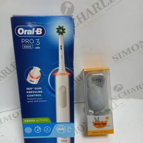 LOT OF TWO TO INCLUDE ORAL B PRO 3 AND BABY TEETHING TOY