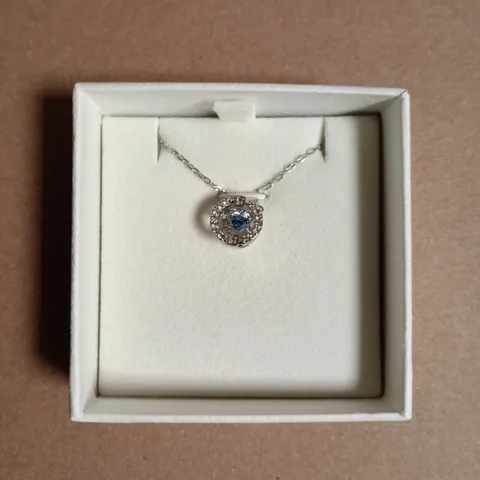 SWAROVSKI NECKLACE WITH BLUE CENTER STONE AND CRYSTAL HALO