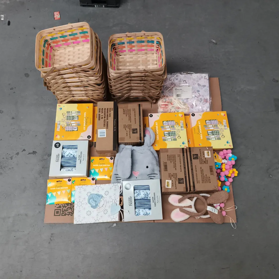 PALLET CONTAINING LARGE QUANTITY OF EASTER DECORATIONS AND ACCESSORIES TOO INCLUDE WOODEN EASTER BASKETS , EASTER SCAPING KITS , EASTER CRACKERS  , BANNERS AND EASTER GIFT BAGS , ETC  