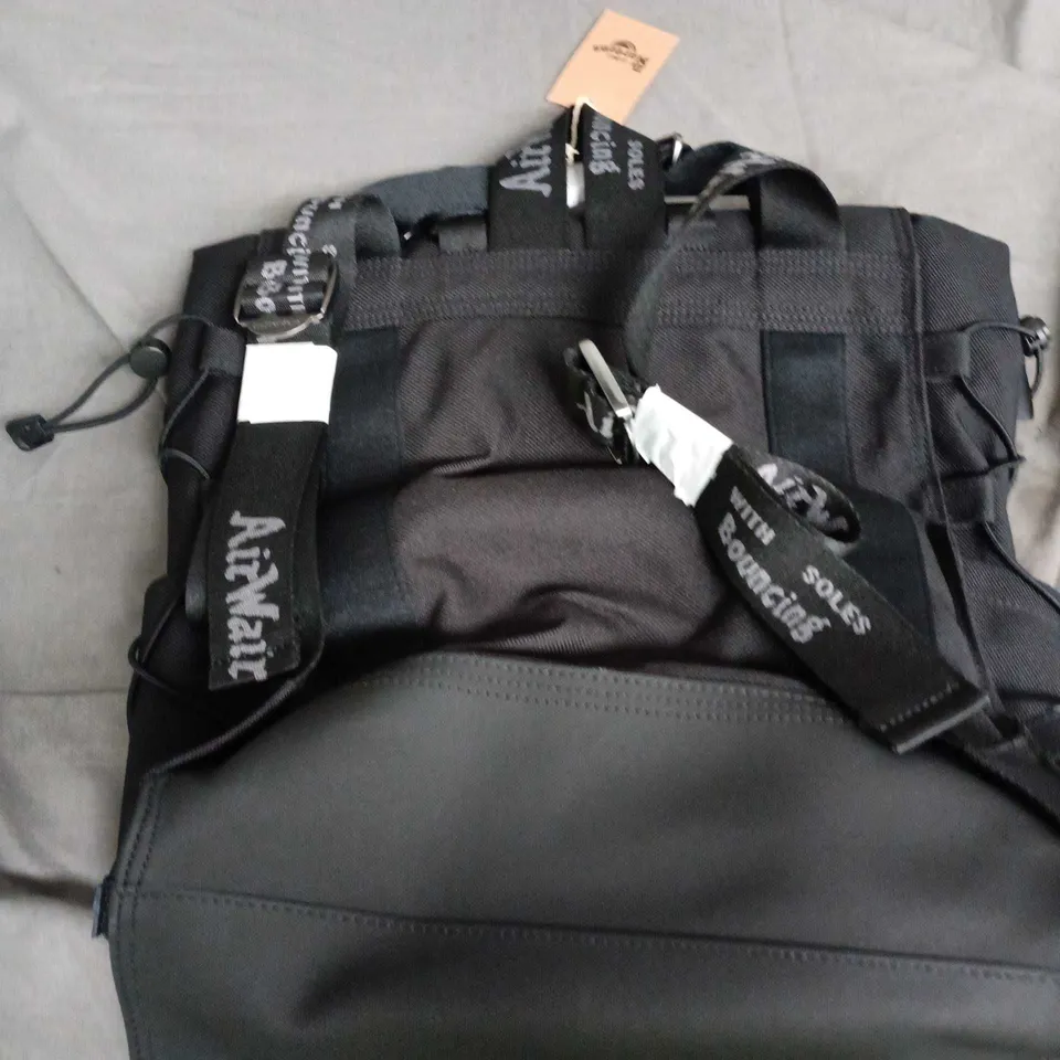 DR.MARTENS BLACK TACTICAL BACKPACK WITH MOLLE-STYLE WEBBING AND MULTIPLE POCKETS 
