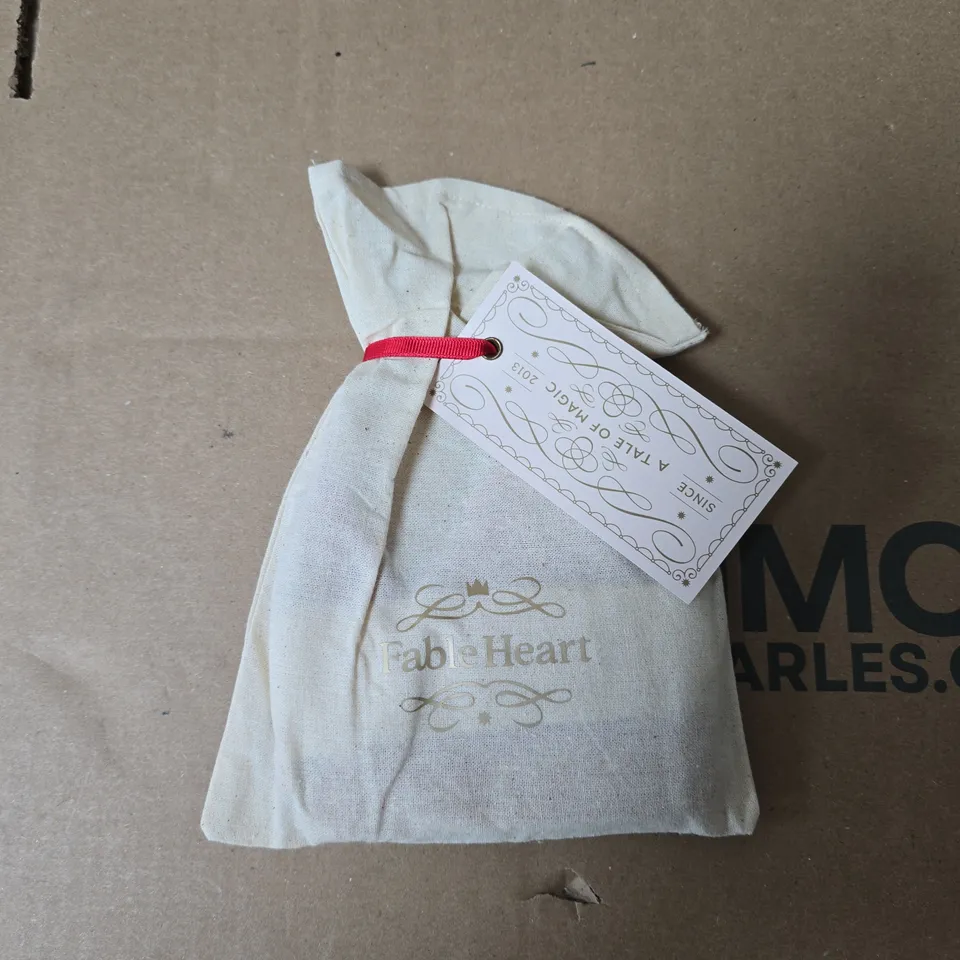 FABLE HEART  RED CROWN HEADBAND WITH 'BELIEVE' MOTIF; WHITE FABRIC DRAWSTRING POUCH