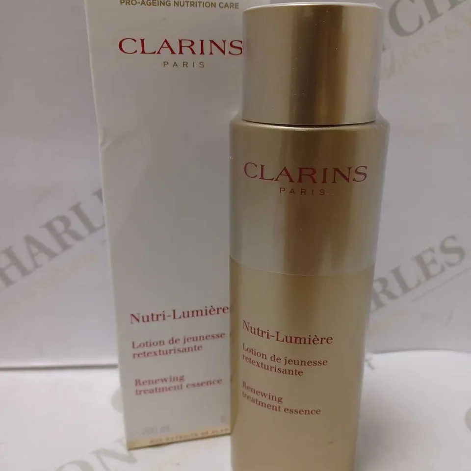 CLARINS NUTRI-LUMIERE RENEWING TREATMENT ESSENCE 200ML
