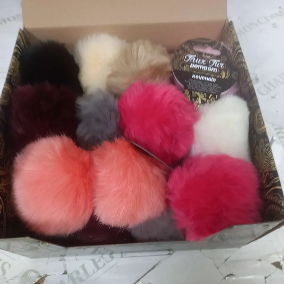 LOT OF 4 BOXES OF FAUX FUR POM POM KEYRINGS