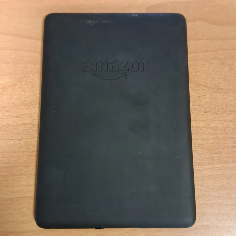 UNBOXED AMAZON KINDLE E-READER IN FOLIO CASE