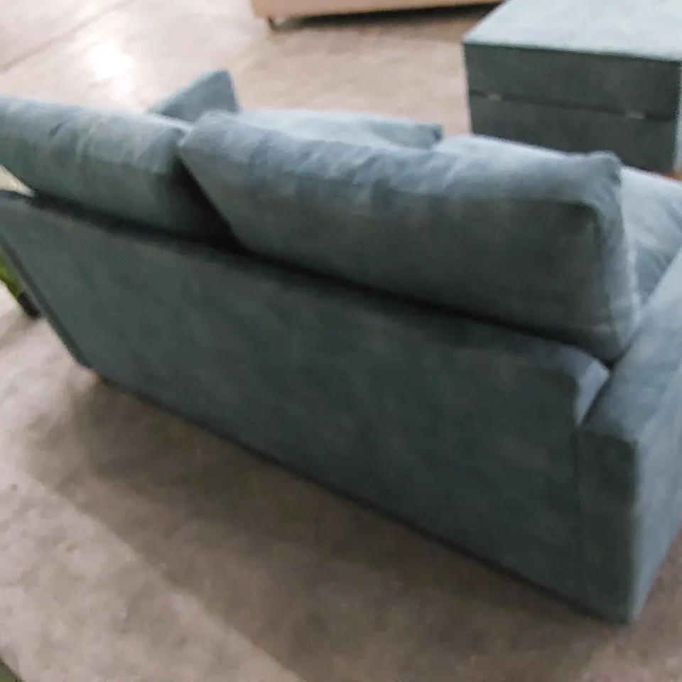 THE FOXHAM SOFA BED UPHOLSTERED IN OCEAN FABRIC WITH OTTOMAN STOOL