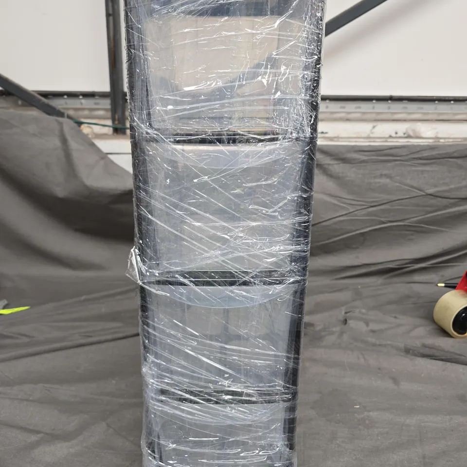 TALL PLASTIC STORAGE UNIT  / APPLIANCE HOUSING WRAPPED IN PLASTIC 