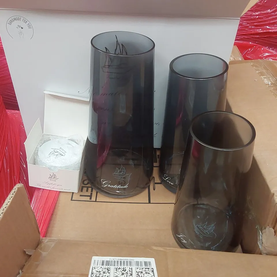PALLET CONTAINING APPROXIMATELY 9 VESSEL OF JOY VASE AND SCENTED CANDLE SETS ECT