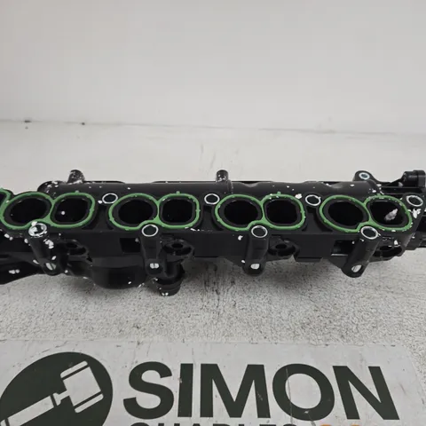 AUTOMOTIVE ENGINE COMPONENT WITH MULTIPLE CIRCULAR PORTS