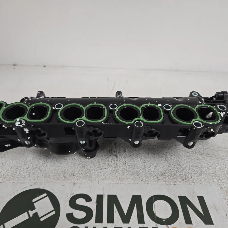AUTOMOTIVE ENGINE COMPONENT WITH MULTIPLE CIRCULAR PORTS