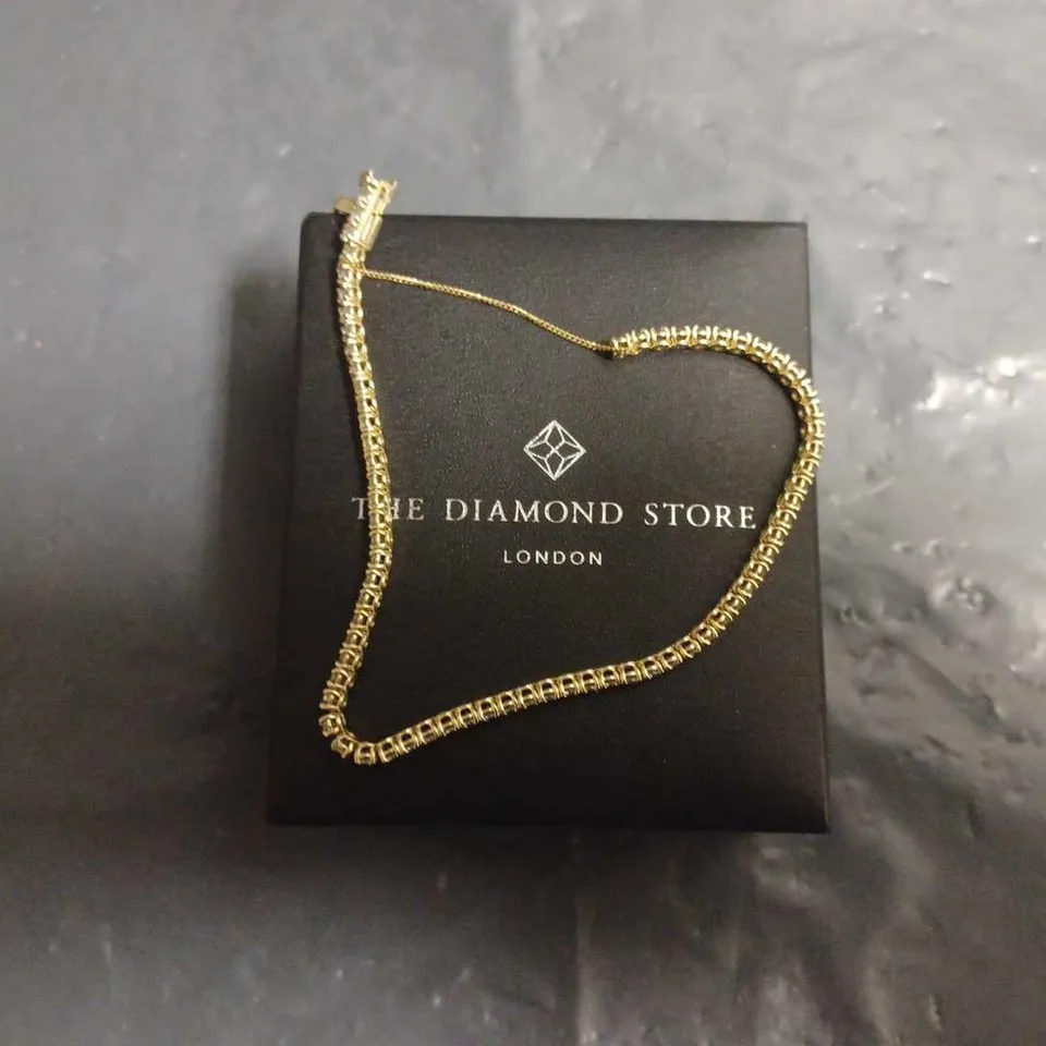 BOXED THE DIAMOND STORE GOLDEN TENNIS BANGLE 