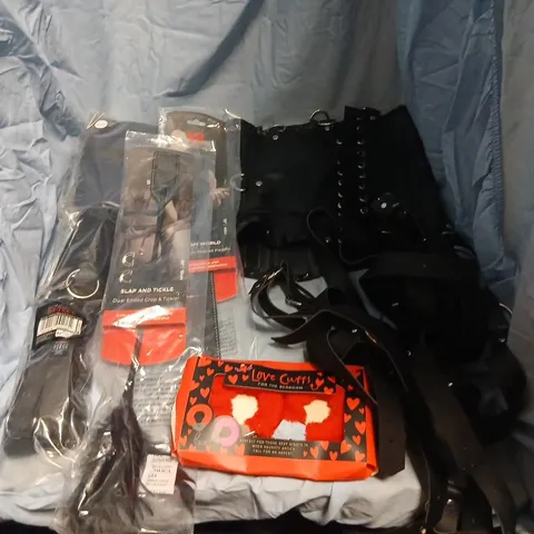 ASSORTED BONDAGE PRODUCTS TO INCLUDE; ANN SUMMERS BDSM ACCESSORIES SET – BLACK LEATHER WAIST CINCHER/CORSET, BONDAGE CUFFS, PADDLE & DUAL ENDED CROP & TICKLER, LOVE CUFFS