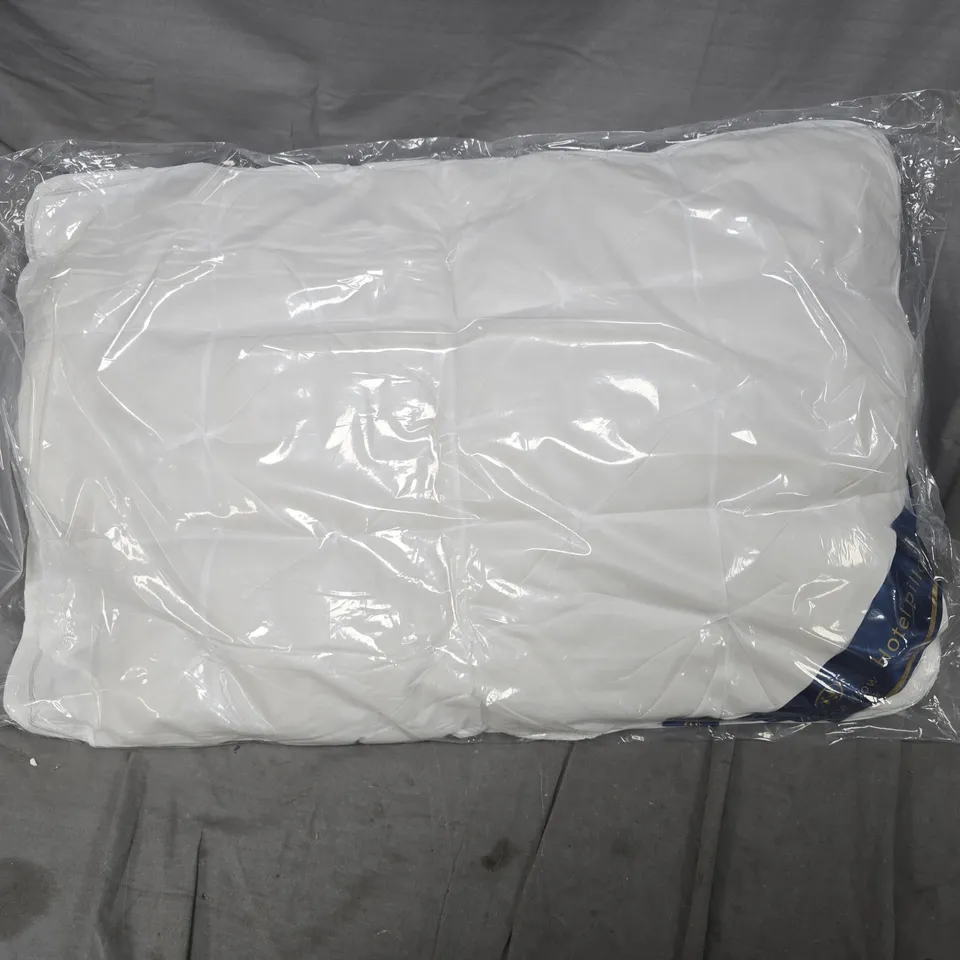 4X WHITE PILLOW IN SEALED PACKAGING WITH BLUE AND GOLD LABEL