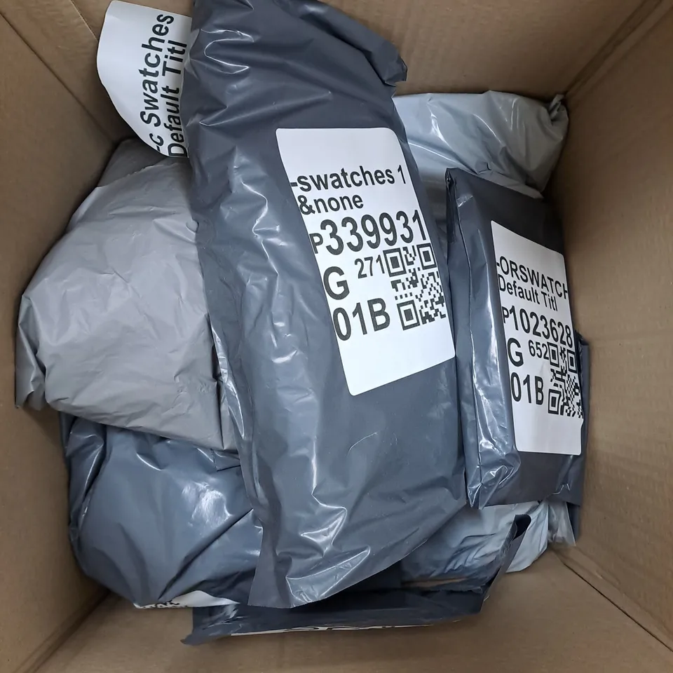 BOX OF APPROXIMATELY 7 PACKS OF FABRIC SWATCHES - VARIOUS COLOURS