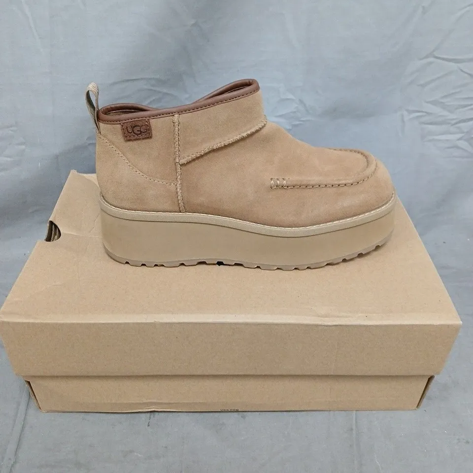 BOXED PAIR OF UGG SIDE ZIP SHOES - 5