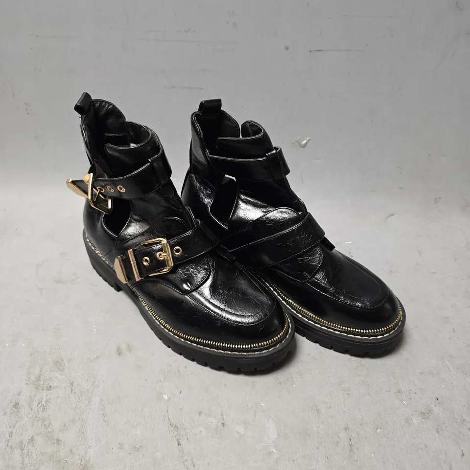 UNBOXED PAIR OF RIVER ISLAND BUCKLE STRAP BOOTS IN BLACK - 6