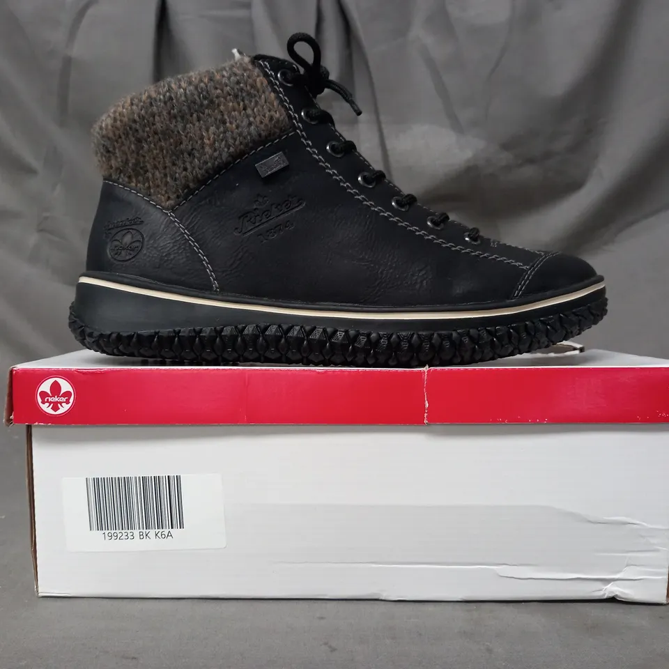 BOXED PAIR OF RIEKER WATER RESISTANT BOOTS IN BLACK SIZE 6.5
