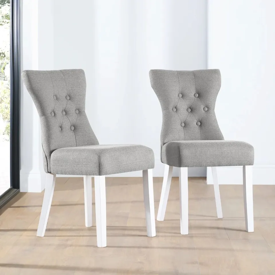 BOXED BEWLEY LIGHT GREY FABRIC BUTTON BACK DINING CHAIR WITH WHITE LEGS